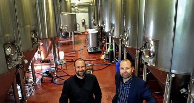 Craig (right) with colleague jack at their brewery.