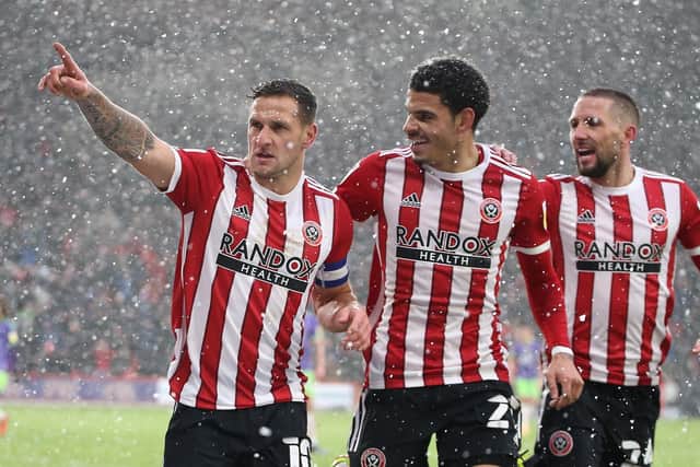 Conor Hourihane, right, will face his former club Swansea City for Sheffield United this weekend: Alistair Langham / Sportimage