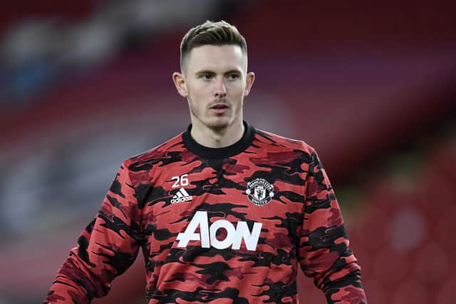 Dean Henderson of Manchester United warms up ahead of the Premier League match between Sheffield United and Manchester United at Bramall Lane on December 17, 2020 in Sheffield, England. (Photo by Peter Powell - Pool/Getty Images)