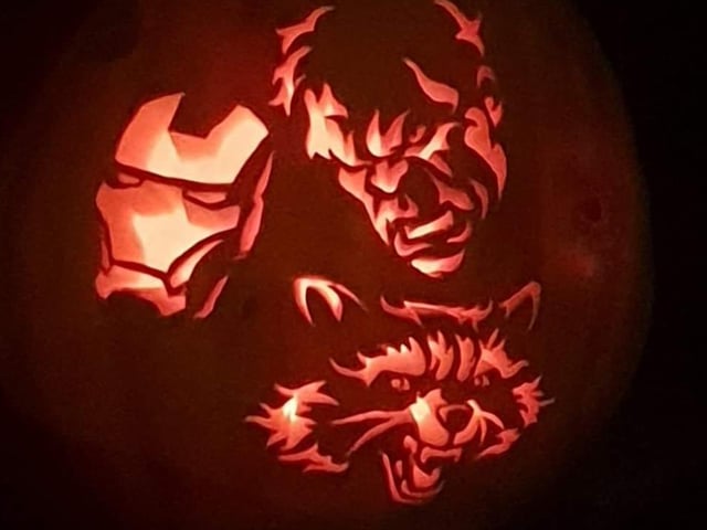 Hayden MrTape Watt carved superheroes into a pumpkin.