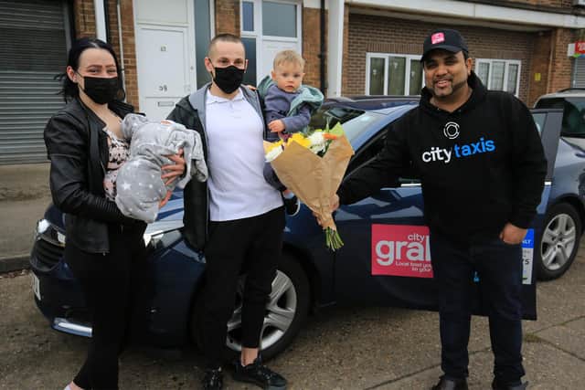 A baby was born in the back of a taxi last week. Taxi driver Mujahid Hussain, pictured on the right, with the family, dad Kamil Truss, mum Natalia Jodello, newborn Filip and one-year-old Kuba. Picture: Chris Etchells