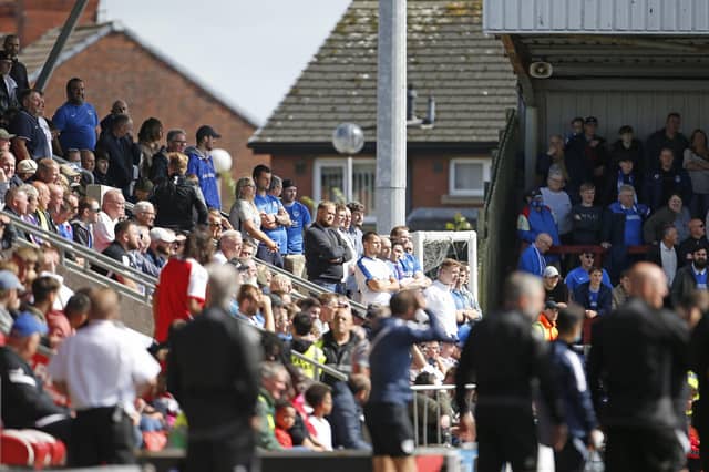 Portsmouth fans in the away end at Highbury Stadium, Fleetwood on opening day of the season. Picture: Paul Thompson