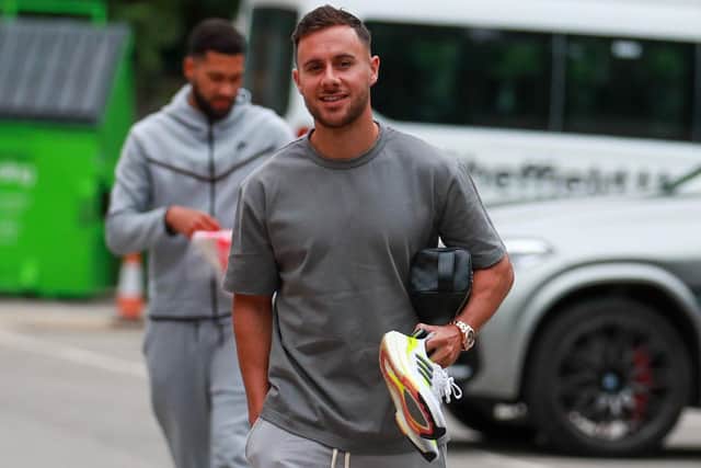 George Baldock was all smiles as he arrived at training this morning - Simon Bellis/Sportimage/Sheffield United