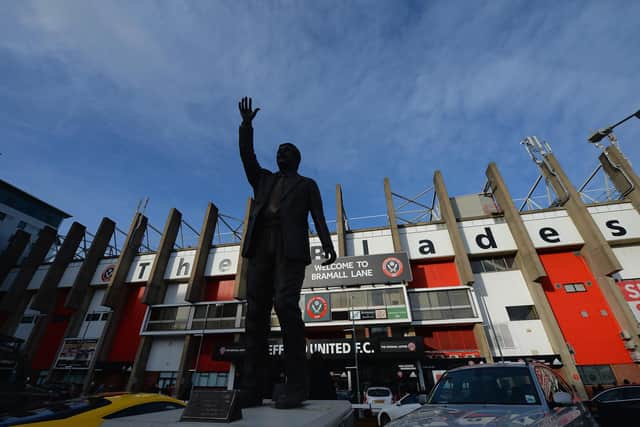 The statue of Derek Dooley sits behind the South Stand at Bramall Lane. (Photo by Tony Marshall/Getty Images)