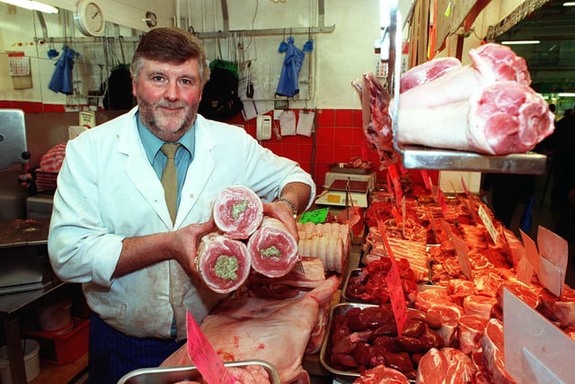 Butcher David Grocock  from F Hawksworth Butchers Stall at Castle Markets seen in is seen in 1999