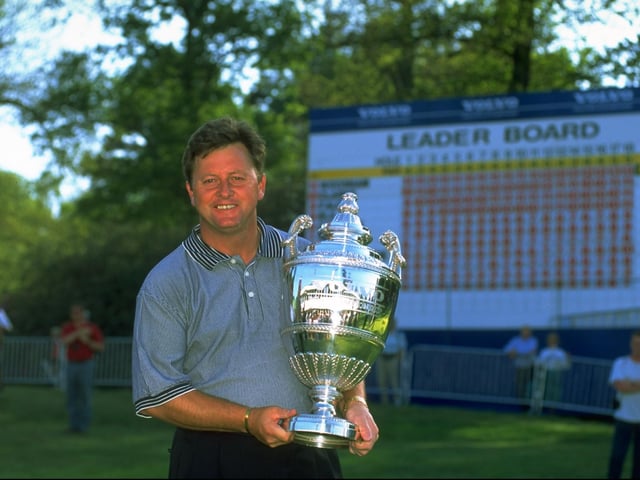 Ian Woosnam shows off his trophy after winning the Volvo PGA at Wentworth in 1997. The Welshman had previously won the event in 1988 when he finished two strokes clear of Seve Ballesteros and England's Mark James.