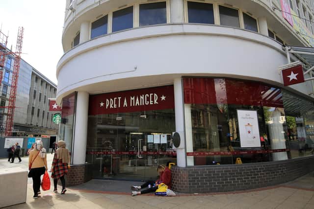 A man lies slumped in the doorway of Pret A Manger on Fargate after it shut down. Picture: Chris Etchells