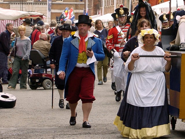 International Festival Of The Sea (IFOS) in the Naval Dockyard , today was the first day of the 4 day festival 28th June 2005
Pictured is a parade in Anchor Lane
Picture Paul Jacobs 053086-2