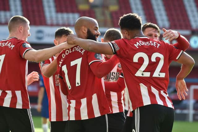 Sheffield United striker David McGoldrick celebrates with his teammates after scoring his side's third goal in the 3-0 win over Chelsea at Bramall Lane. (Photo by Rui Vieira/Pool via Getty Images)