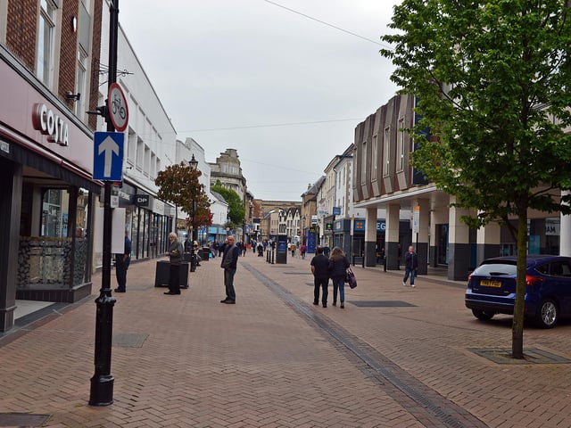 Mansfield Town centre 10 weeks into lockdown. Signs going up in preparation for more lockdown easing on Monday June 15th.