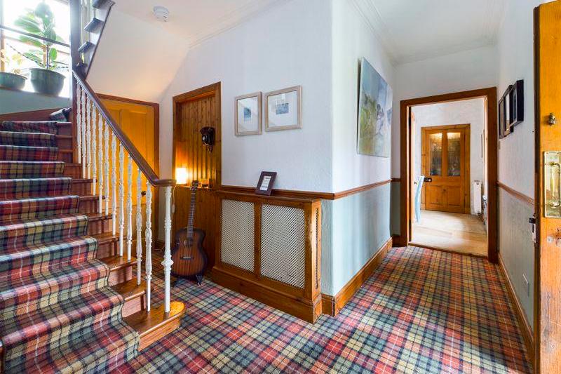 Beautiful hallway welcomes visitors, leaving them in little doubt that they are in Bonny Scotland.
