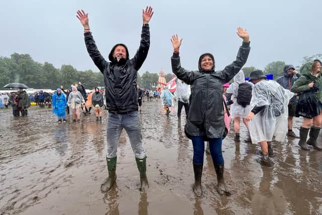 Tramlines festival goers caught in the torrential rain that hit Hillsborough Park. Residents have said where they think the major Sheffield festival should take place after weekend mud bath. Photo: Dean Atkins