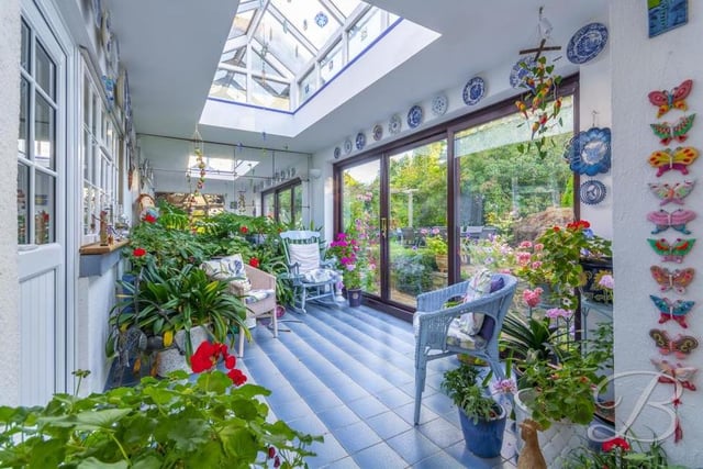 Not many properties can offer a garden room. But this is a marvellous place to sit and relax or admire the outdoor space, complete with a skylight, tiled floor and sliding doors to the back garden.