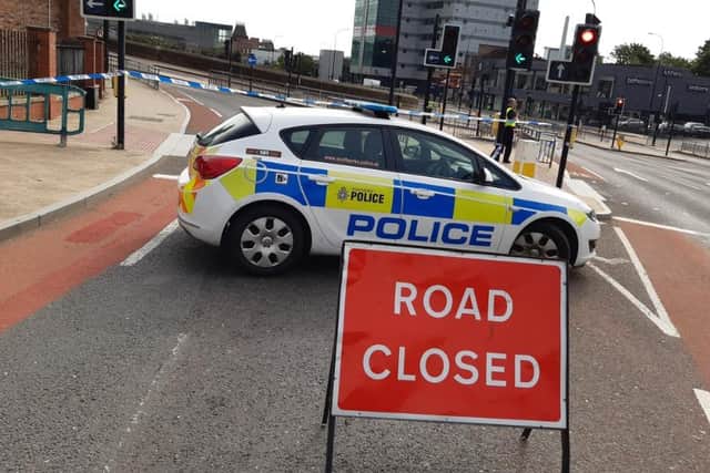 A Sheffield building was devastated by fire last night in a suspected arson incident – leaving Spital Hill closed this morning. Picture show the police cordon in place at Derek Dooley Way