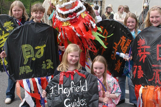 Hayfield May Queen Procession in 2008 where the Hayfield Guides and their Chinese dragon took to the streets