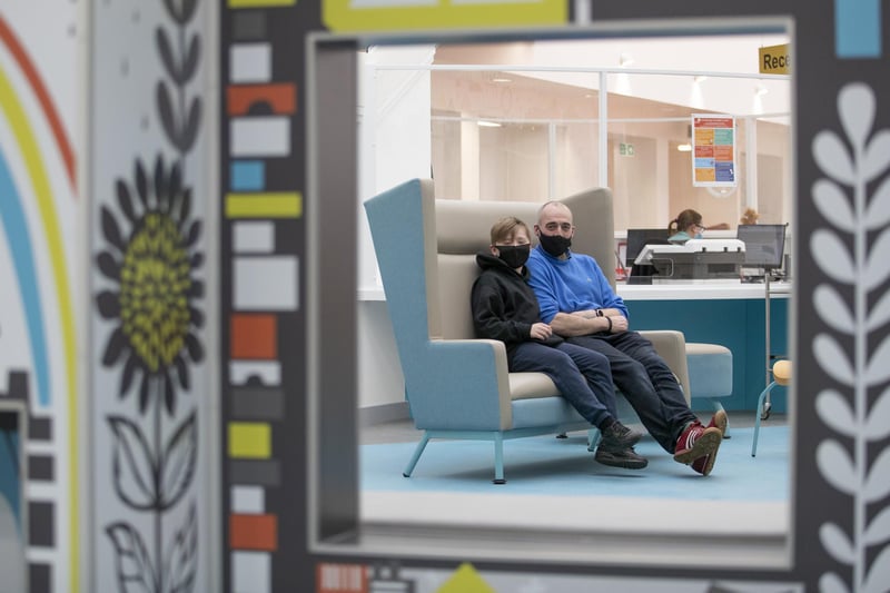 Outpatient Robbie Marshall, 11, with his father Pete Marshall, waiting in The Pod area at the new Royal Hospital for Children and Young People Edinburgh.