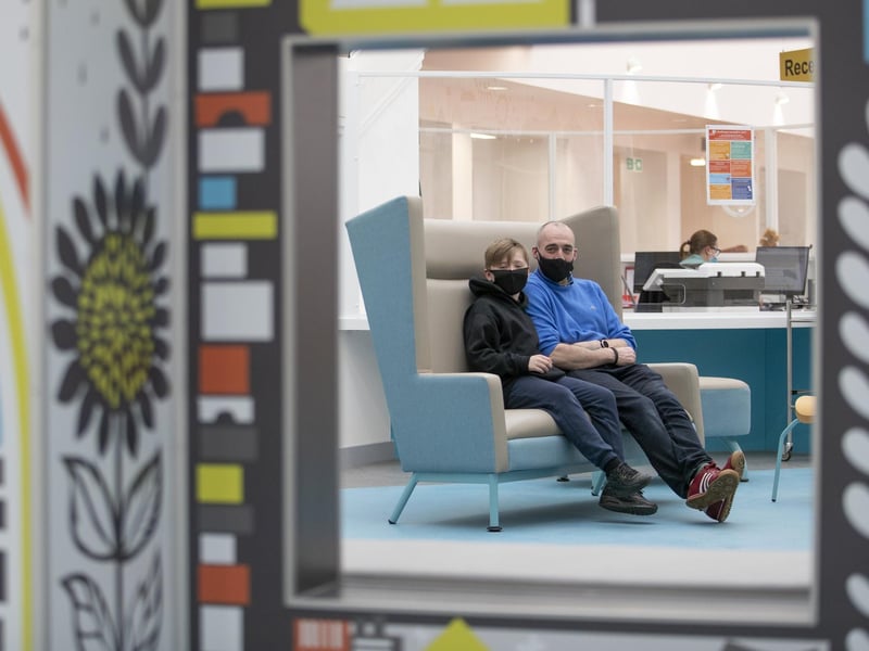 Outpatient Robbie Marshall, 11, with his father Pete Marshall, waiting in The Pod area at the new Royal Hospital for Children and Young People Edinburgh.