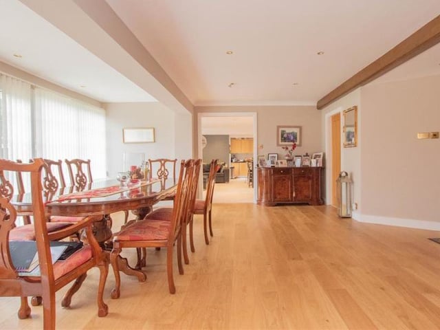 A second shot of the attractive dining hall, which lies at the centre of the first floor. It offers easy access either side to the lounge and open-plan kitchen.