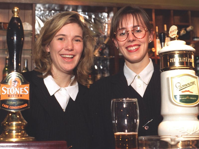Manager Tanya Besford (left) and assistant Nicki Robinson pictured behind the bar at the Streets of Leeds pub, on Street Lane, in January 1996.