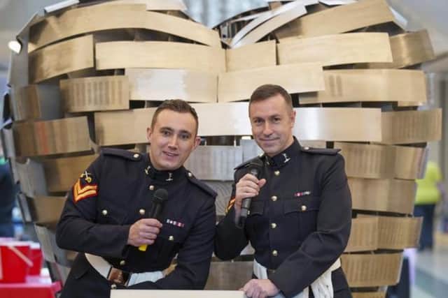 Britain's Got Talent's Soldiers of Swing entertain at a British Heart Foundation event at Meadowhall.