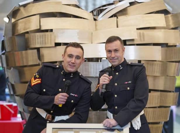Britain's Got Talent's Soldiers of Swing entertain at a British Heart Foundation event at Meadowhall.