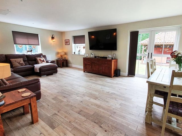 Along with this open-plan room there is a formal living room and separate dining room.