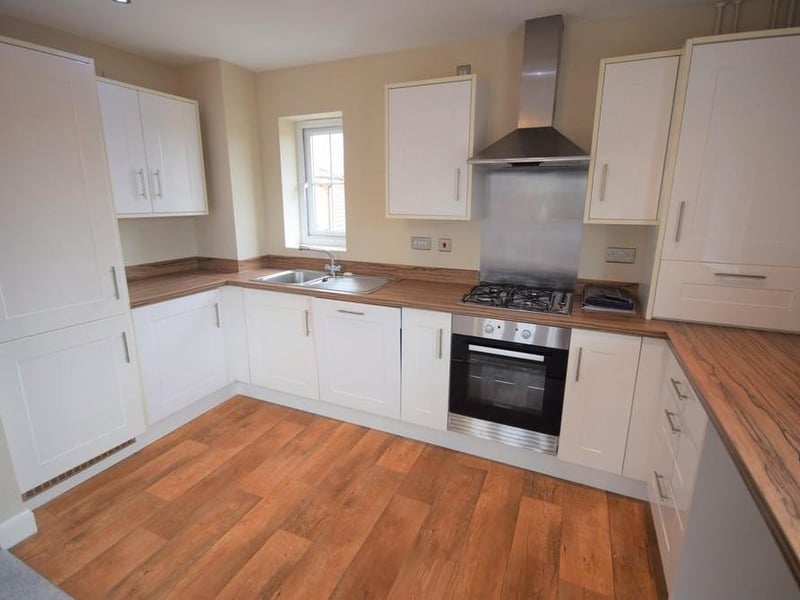 A fabulous open living kitchen providing plenty of natural light through from the UPVC windows and balcony doors. The kitchen area has an extensive range of high gloss units with contrasting worktops incorporating a handy breakfast bar. With a stainless steel electric oven and hob with splashback and complimentary hood over. There are numerous integrated appliances including the fridge freezer, dishwasher, Electrolux washing machine, concealed Ideal Logic boiler, a host of stainless steel socket points, two radiators, wood effect lino flooring, a south facing balcony to sit and relax with afternoon and evening sun.