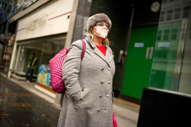 People wear face masks and PPE in Sheffield (Photo by Christopher Furlong/Getty Images)