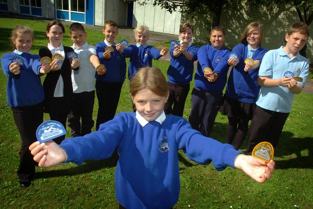 Pupils from Hetton Primary school who achieved  their 1000 meters and 1 mile awards for swimming in 2011. Recognise anyone?