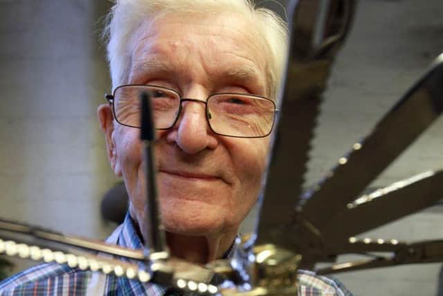 Stan Shaw BEM with one of his knives.