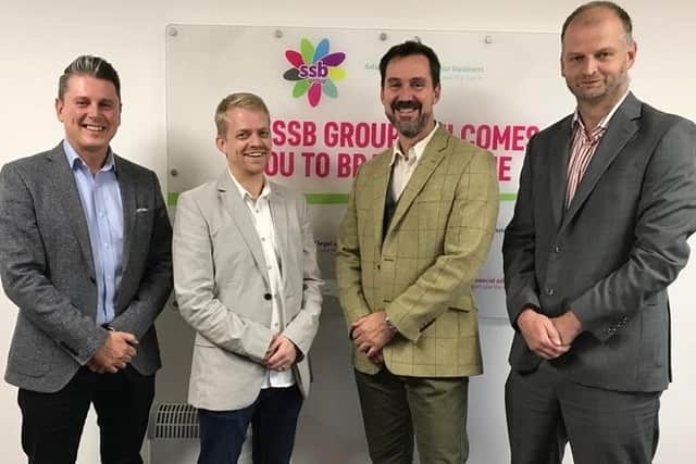 Staff at SSB Law, including co-founder and CEO Jeremy Brooke, second from right