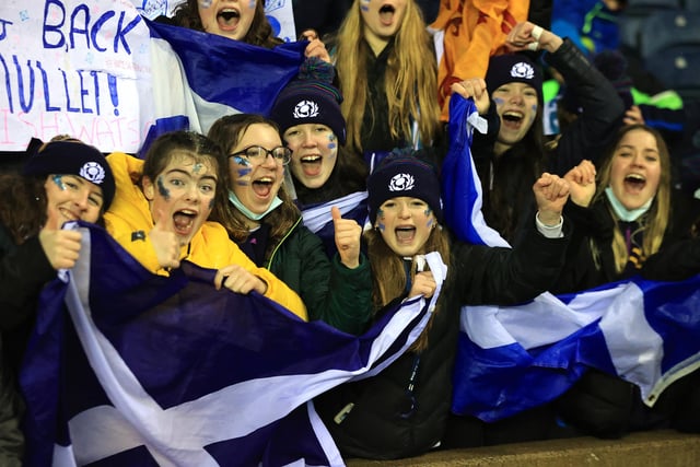 Scotland fans celebrate their victory over England in the Guinness Six Nations match at BT Murrayfield