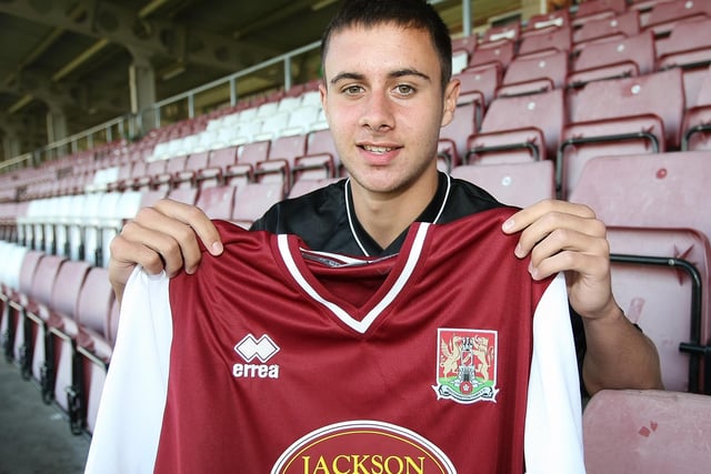 Northampton Town new signing George Baldock poses with a shirt