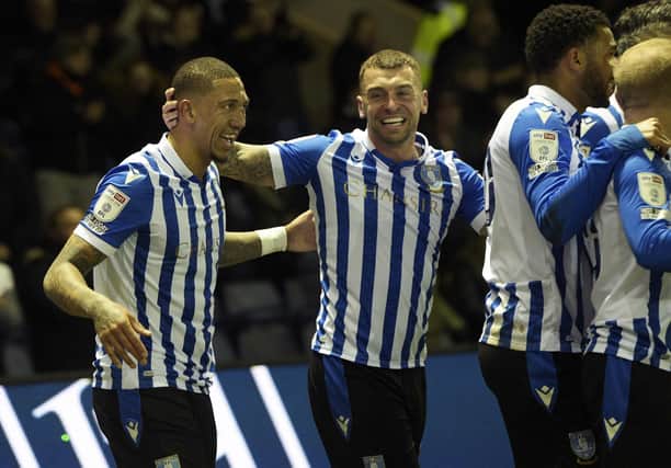 Sheffield Wednesday's players celebrate Liam Palmer's opening goal.