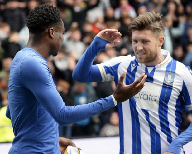 Anthony Musaba is congratulated by Josh Windass, who would later score the third goal, for scoring the first (Picture: Steve Ellis)
