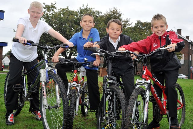 Bailey Waddell, Jamie Lowe (organiser), Mitchell Batty and Regan Watkinson, all aged nine, from St Augustine's Primary School, Worksop, took part in a bike ride around Clumber Park to raise money for Cancer Research in 2010.