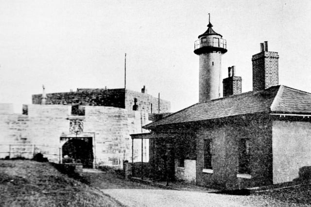 The entrance to Southsea Castle a century ago with the long gone lighthouse keeper's cottage