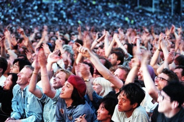 Members of the crowd enjoying the Rolling Stones concert at Don Valley Stadium, Sheffield in July 1995
