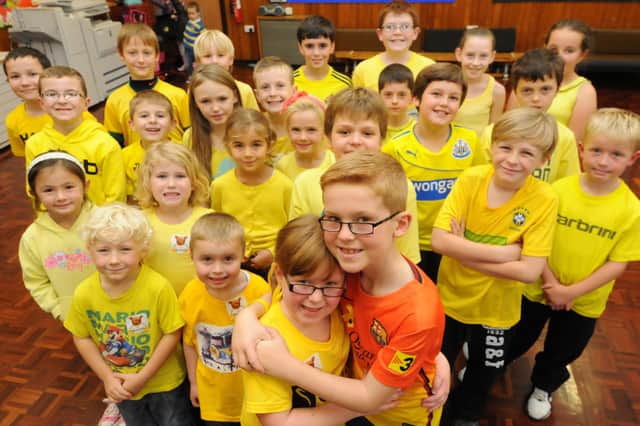 Pupils were pictured at a charity fundraiser seven years ago. Do you recognise anyone in the photo?