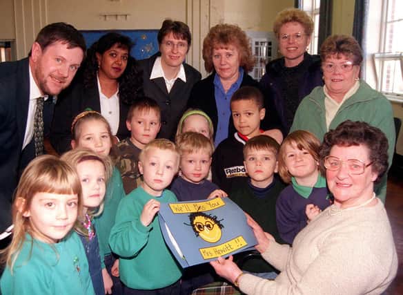 Dinner Lady Norma Hewitt (right) at her retirement party in 1999  after 32 years service  at the Hartley Brook Primary School.  Also pictured with some of the pupils are Headteacher Pete Matlew and Norma's colleagues Valeria Bennett, Caroline Booth, Chris Ozenbrook, Liz Fox and Elaine Allen