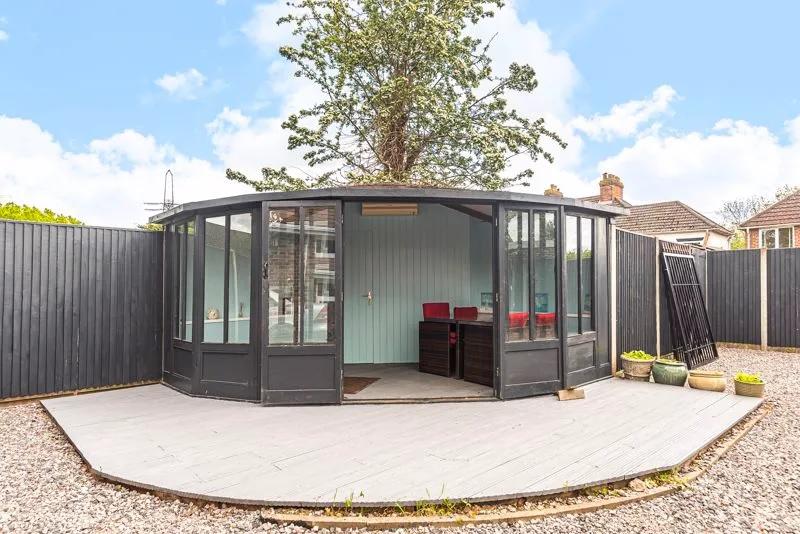 The summerhouse in the garden of the property.