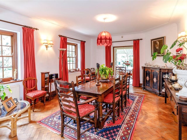 The sitting room opens onto a separate dining room, which is generously sized to provide plenty of room for family meals and entertaining.