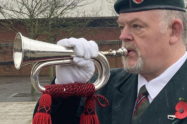 Bugler Colin Longstaff plays the Last Post during the Remembrance Sunday parade.