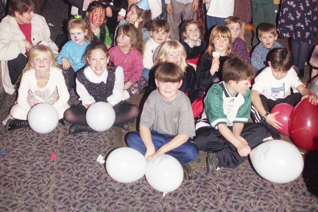 Balloons, ice cream and lots of smiley faces at the 1995 Chipper Club Christmas party.
