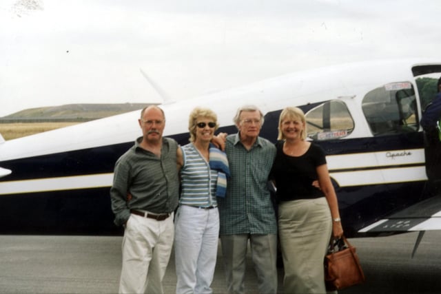 Lewis Wheeler and his family pictured at Sheffield City Airport. Celebrating his 80th birthday after a flight over the Derwent dams with Sheffield City Aviation