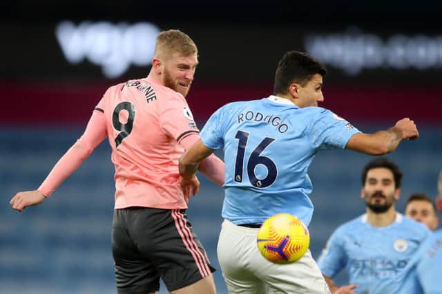 Oli McBurnie retyurned to action following injury against Manchester City: Simon Bellis/Sportimage