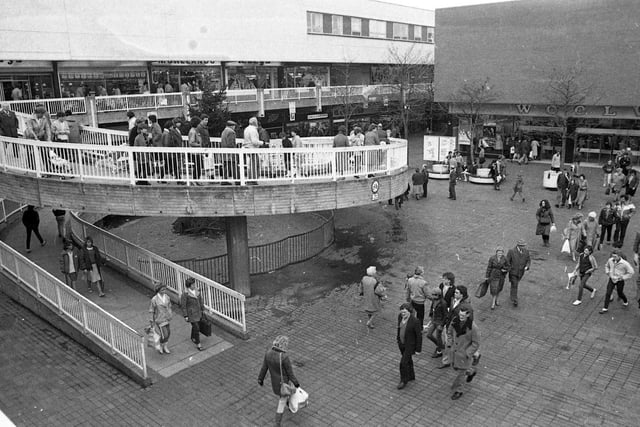 A familiar view from 1976, showing the 'curly' walkway and the Woolworths store at the bottom of it.