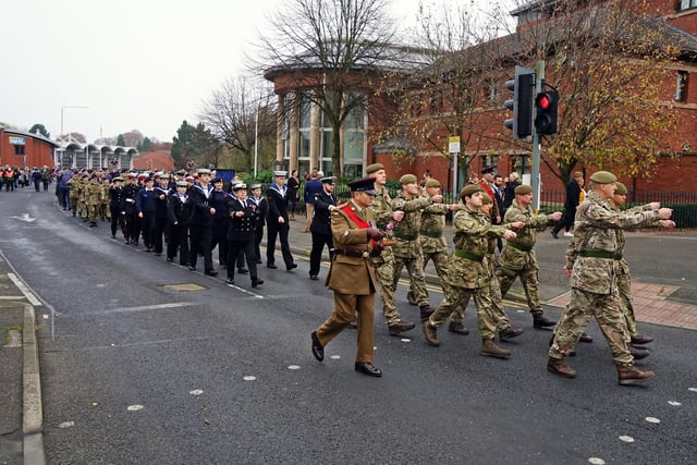 Soldiers and cadets marching past the magistrates' court