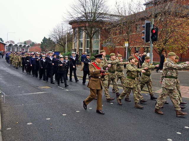 Soldiers and cadets marching past the magistrates' court