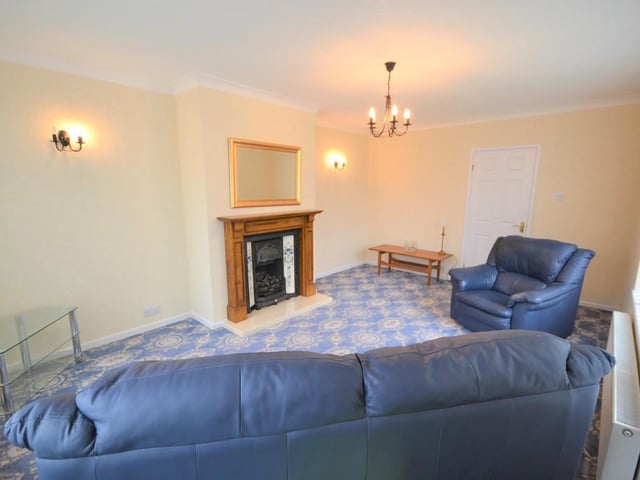 A generous sized and well presented sitting room with pleasant garden views from dual aspect UPVC double glazed windows, this spacious room also enjoys an attractive coal effect gas fire place with tiled hearth and decorative wooden surround. Having various power sockets, tv aerial point, two central heating radiators, wall lighting and coving compliments the ceiling.